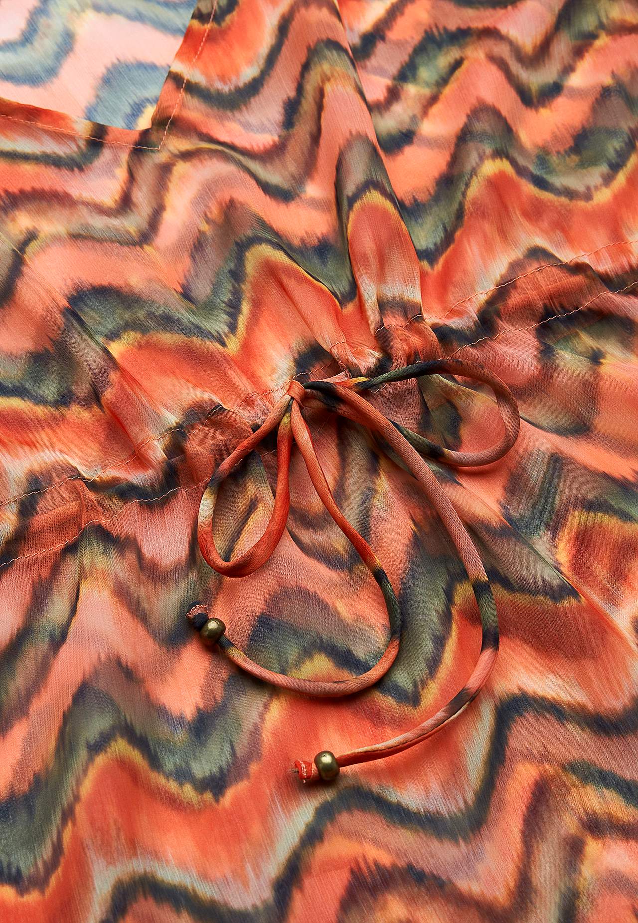 Rakstains pludmales kaftāns