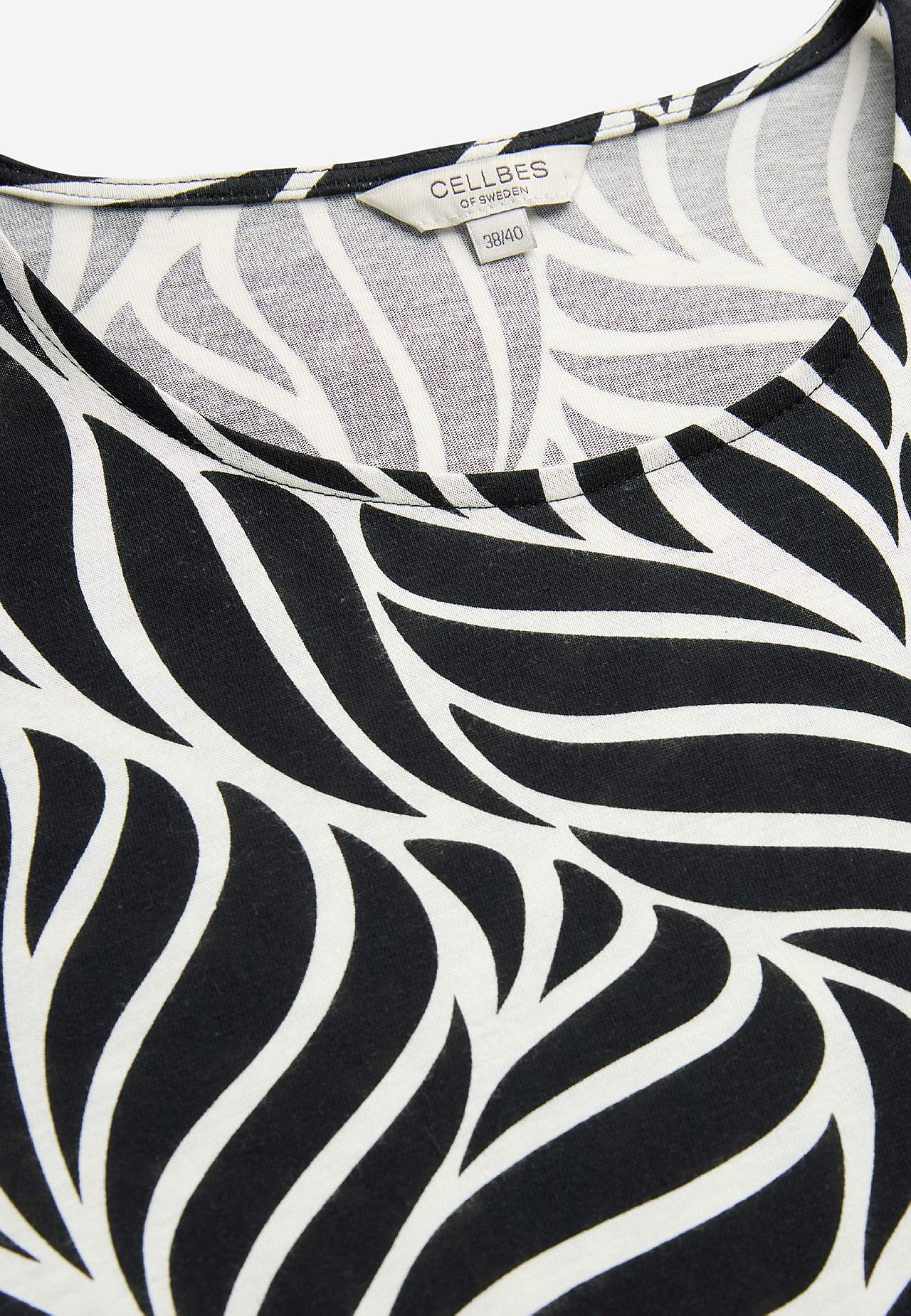 Trikotāžas tunika ar kabatām