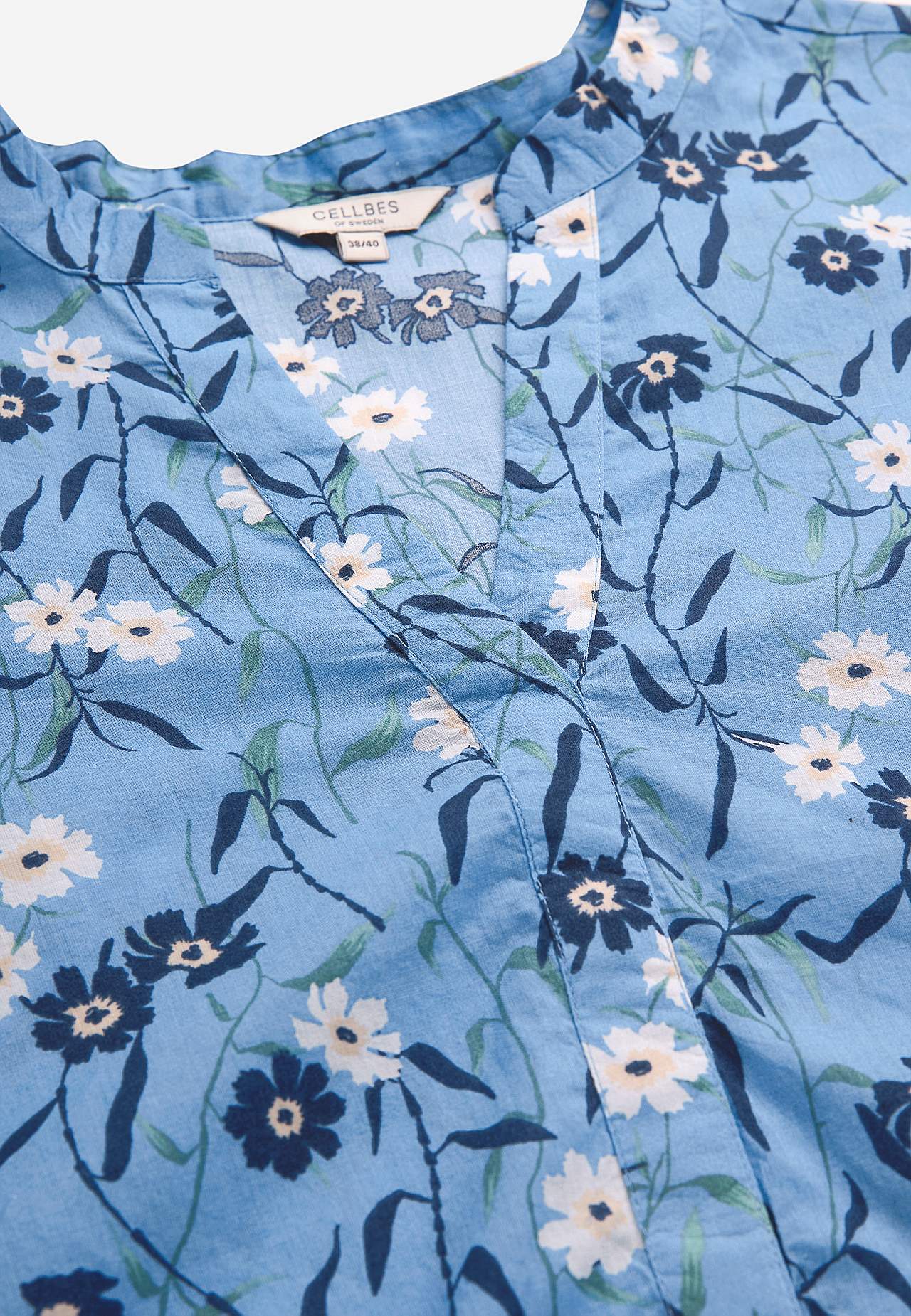 Puķaina auduma tunika