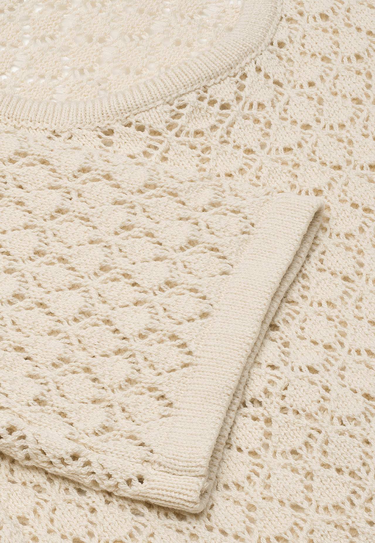 Adīts džemperis ar caurumiņu rakstu