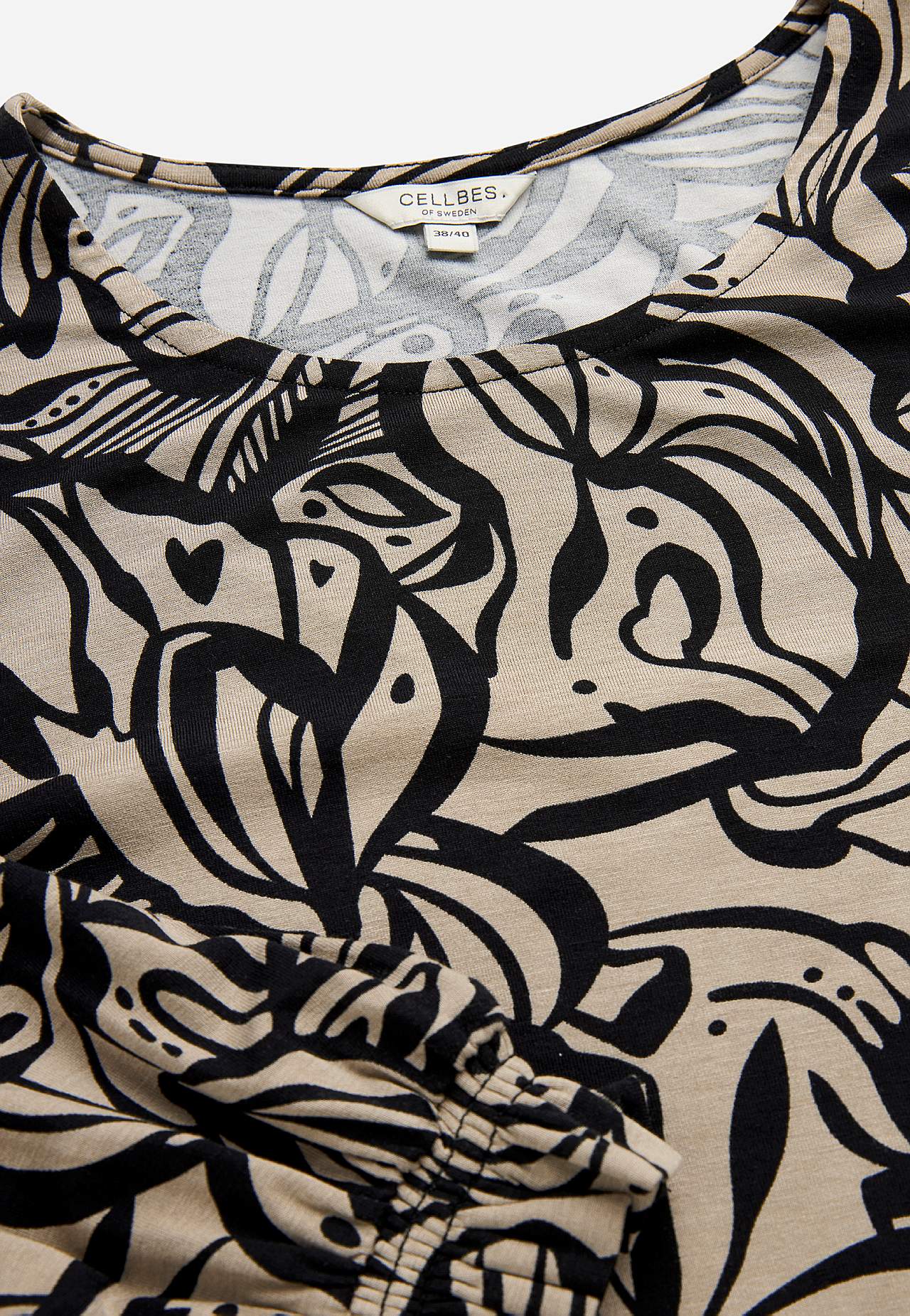 Trikotāžas tunika ar savilkumu