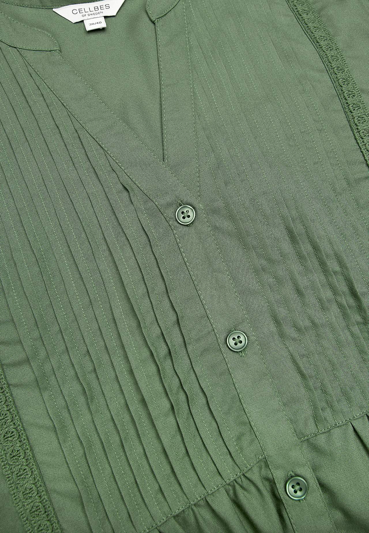 Auduma tunika ar mežģīņu detaļām