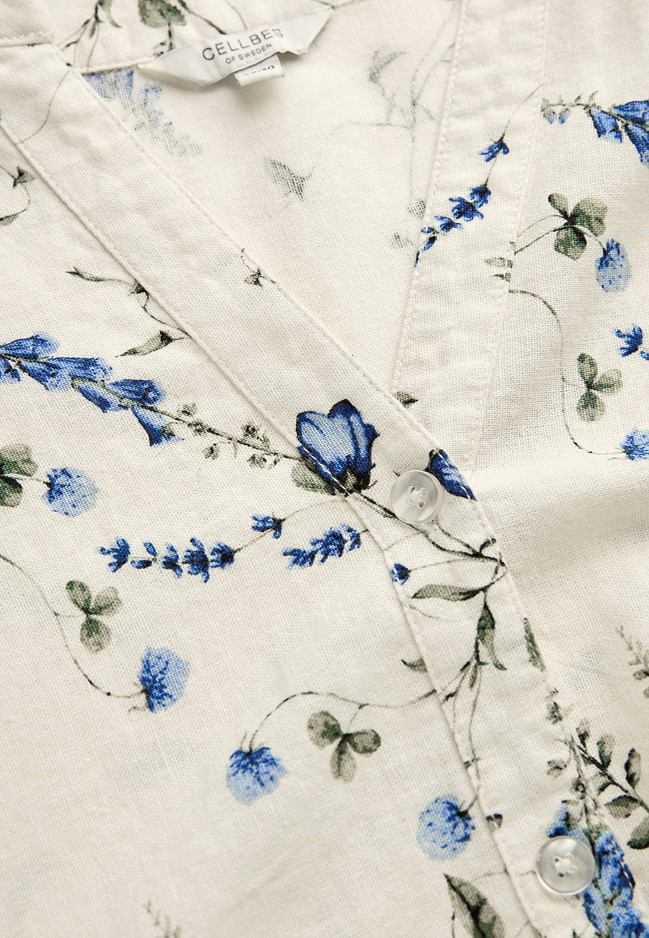 Puķaina lina tunika ar pogām