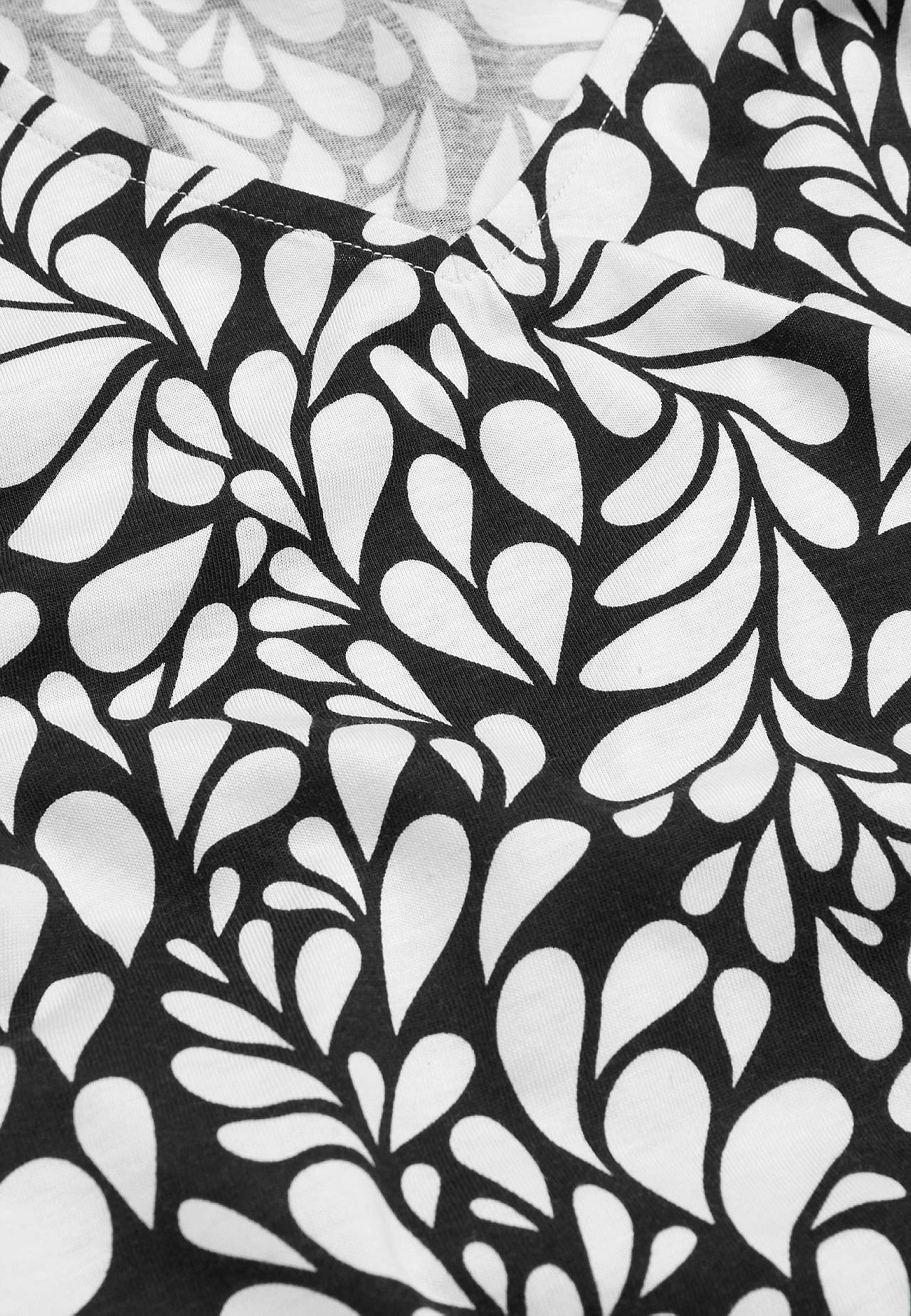 Trikotāžas tops ar īsām piedurknēm