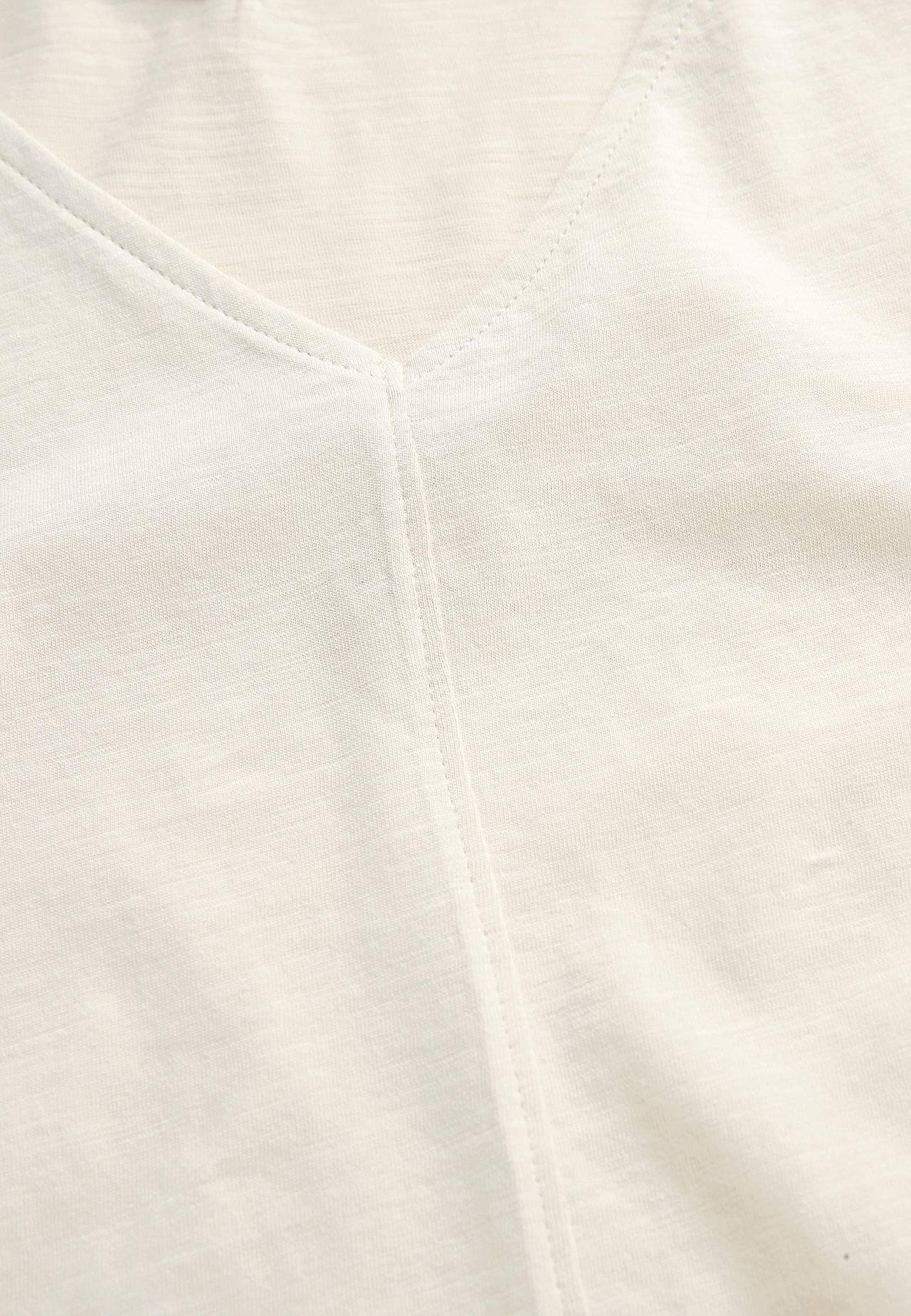 Trikotāžas bezpiedurkņu tops ar V veida kakla izgriezumu