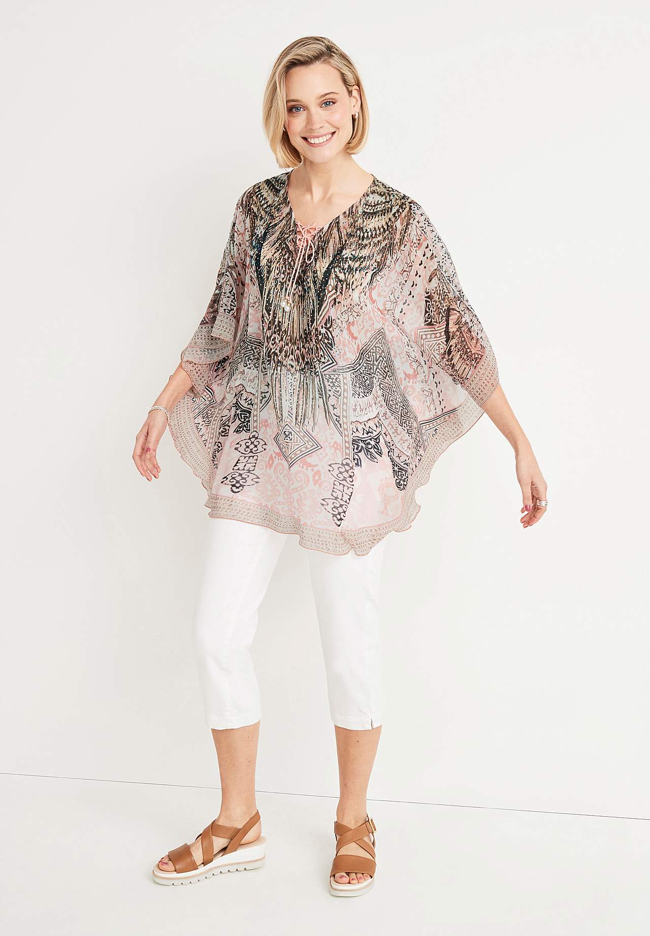 Rakstaina tunika ar spīdumiem