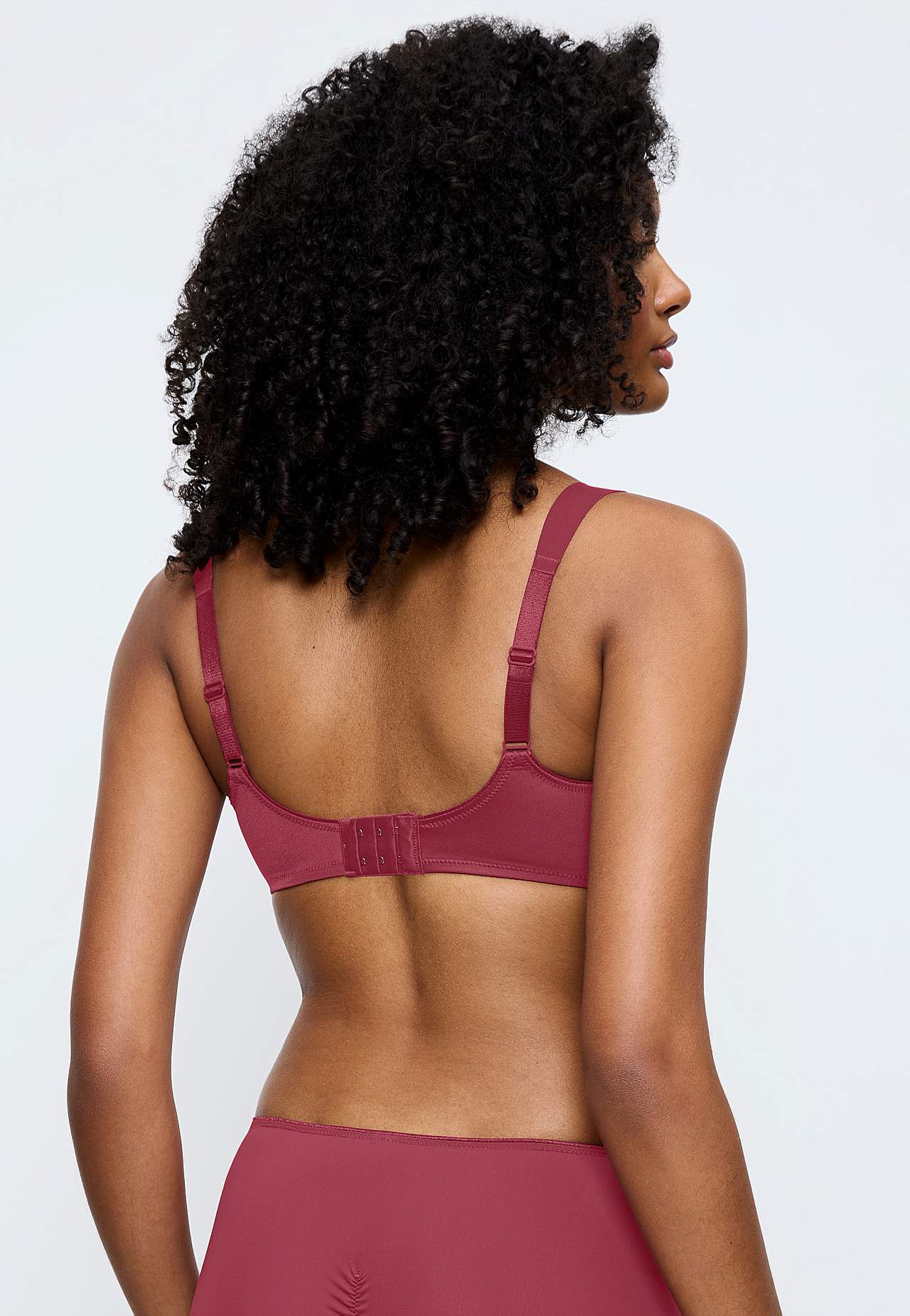 Krūtis vizuāli samazinošs krūšturis ar stīpiņām Essential