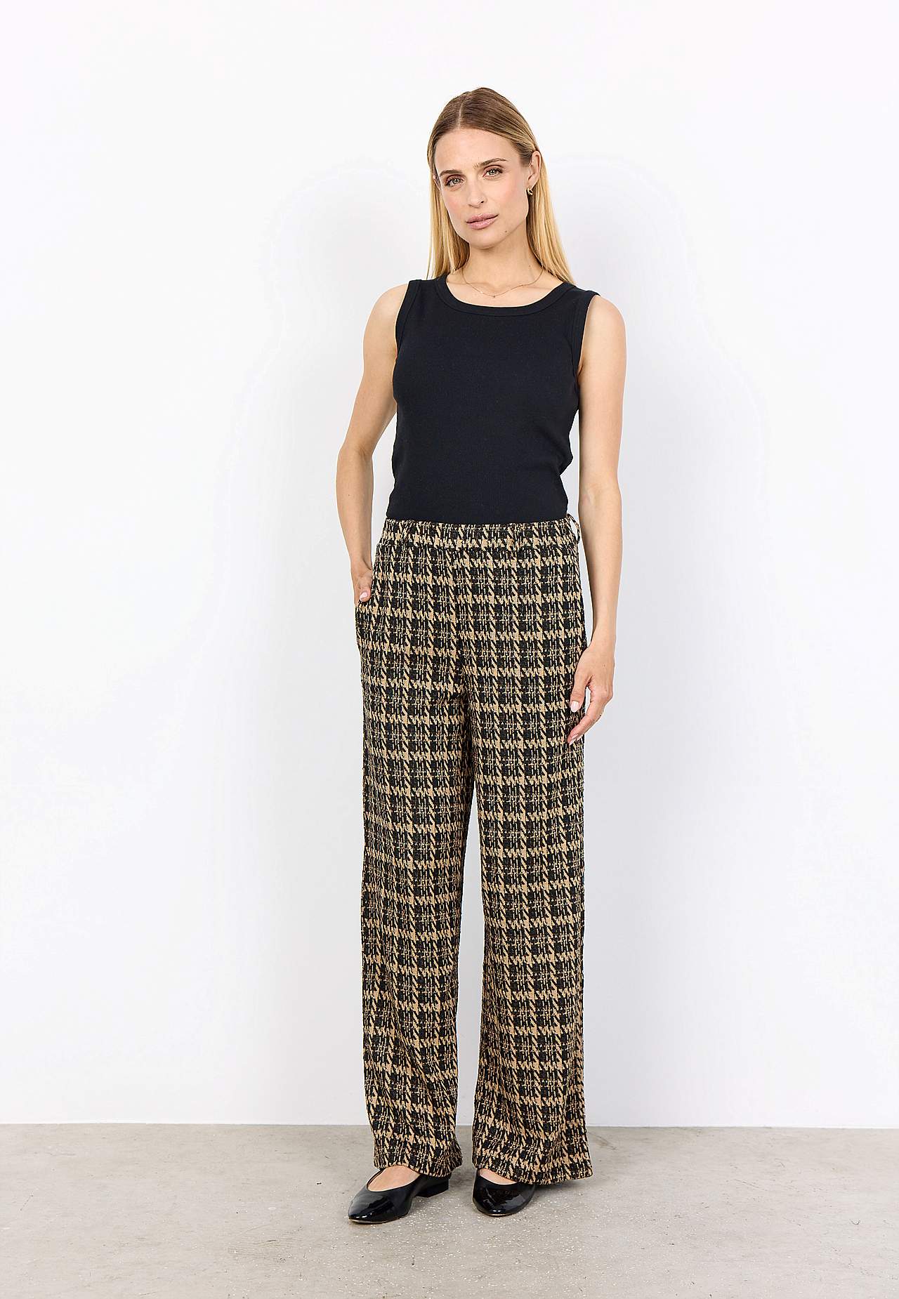 Trikotāžas bikses ar kabatām