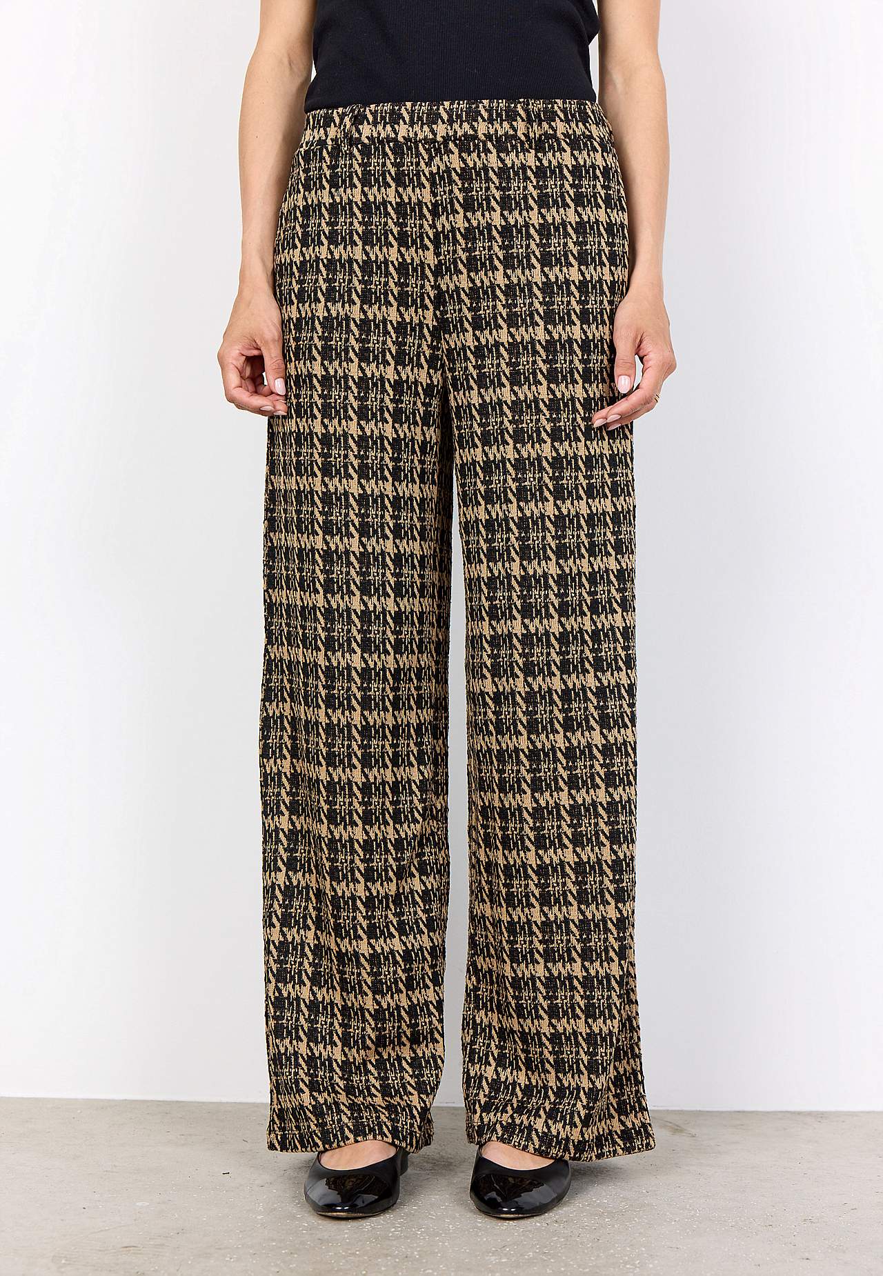 Trikotāžas bikses ar kabatām