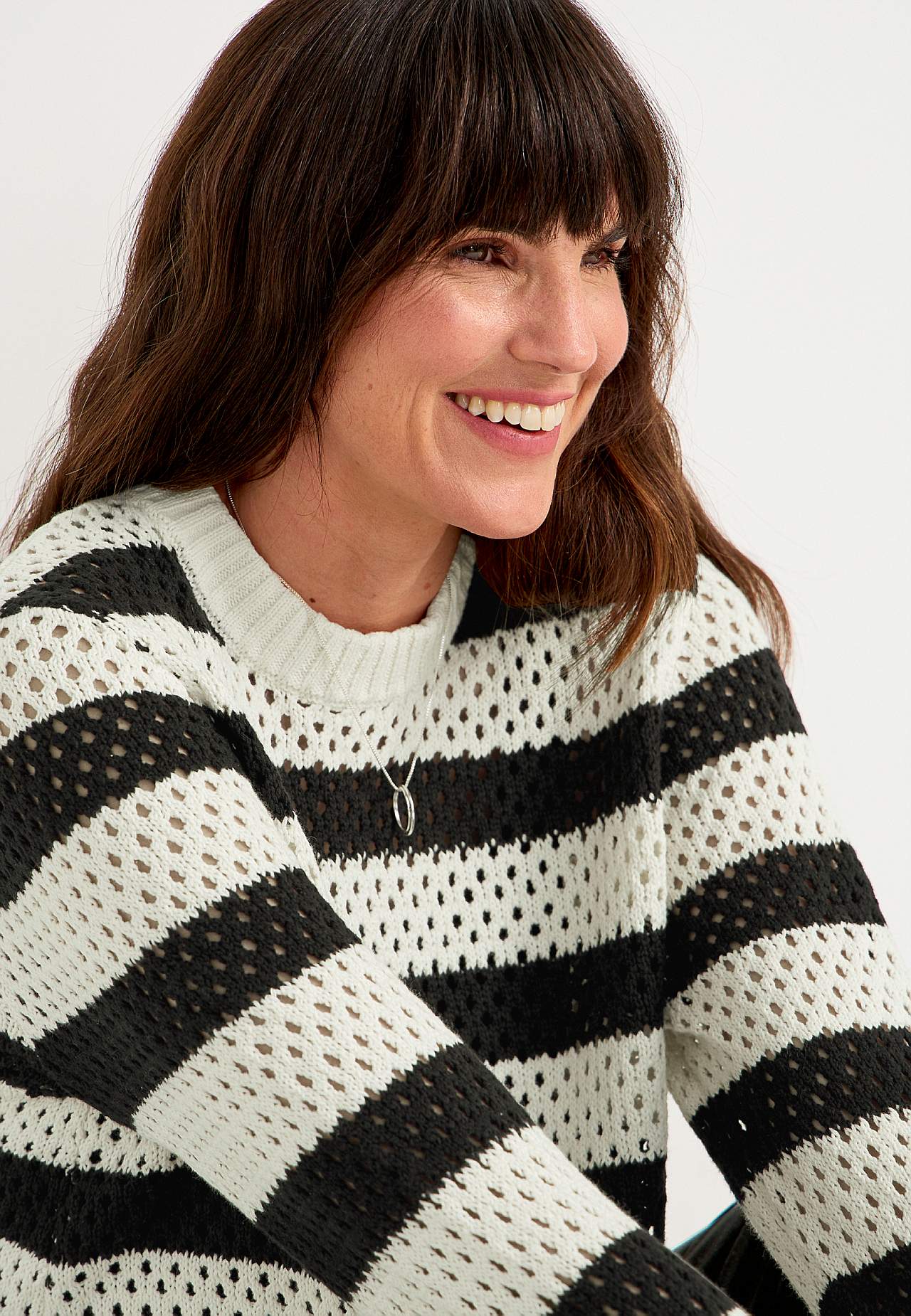 Rakstaina adījuma svītrains džemperis