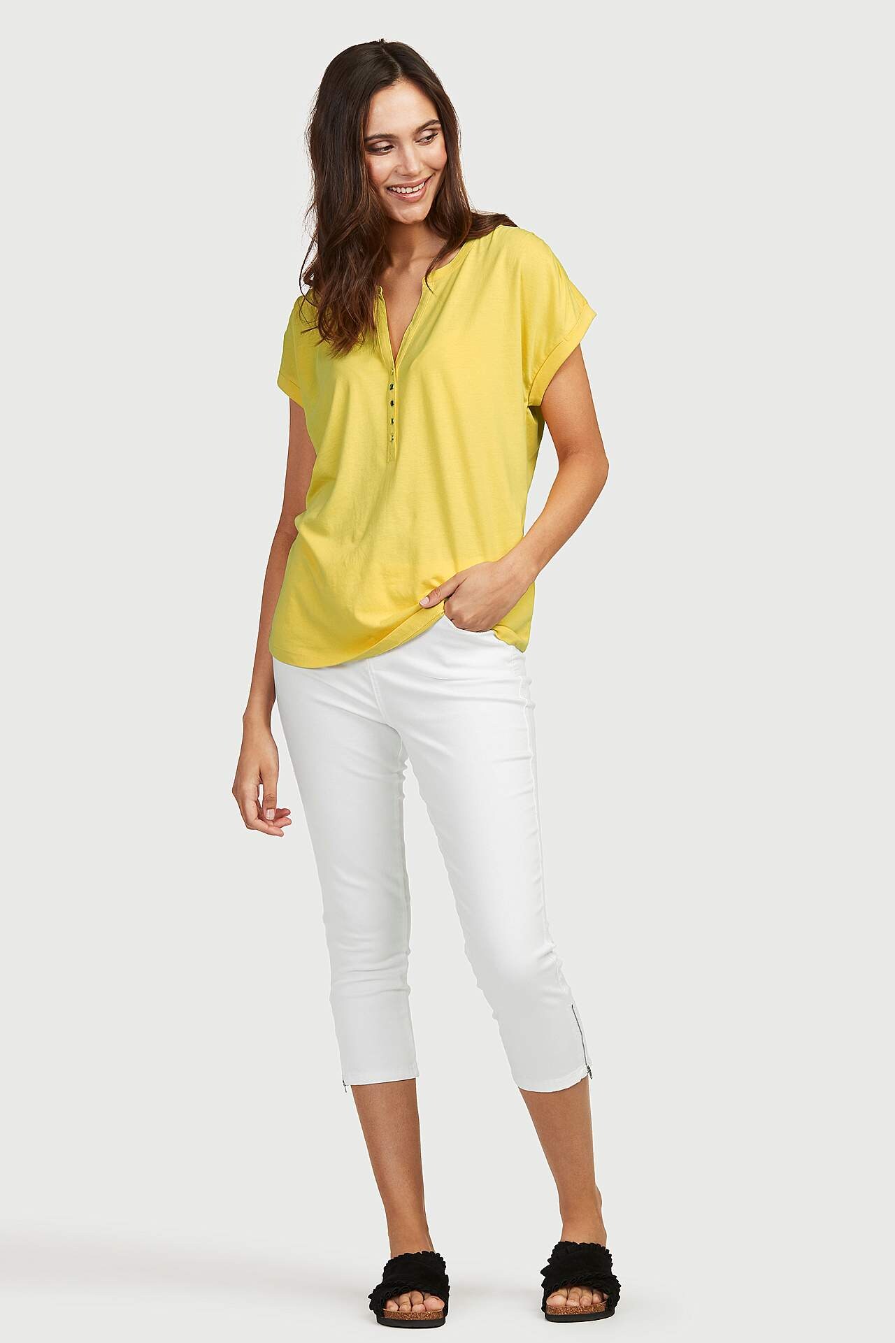 Trikotāžas tops ar metāla pogām