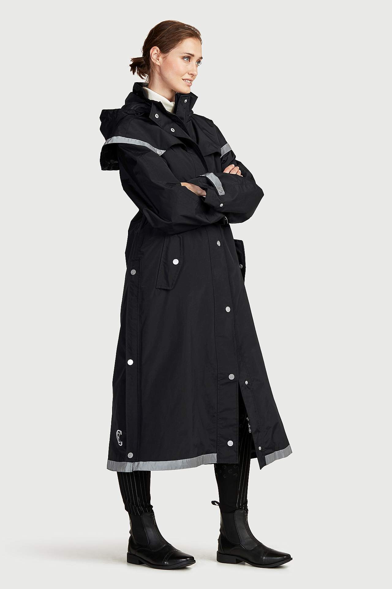 Garš lietusmētelis ar atstarojošām detaļām