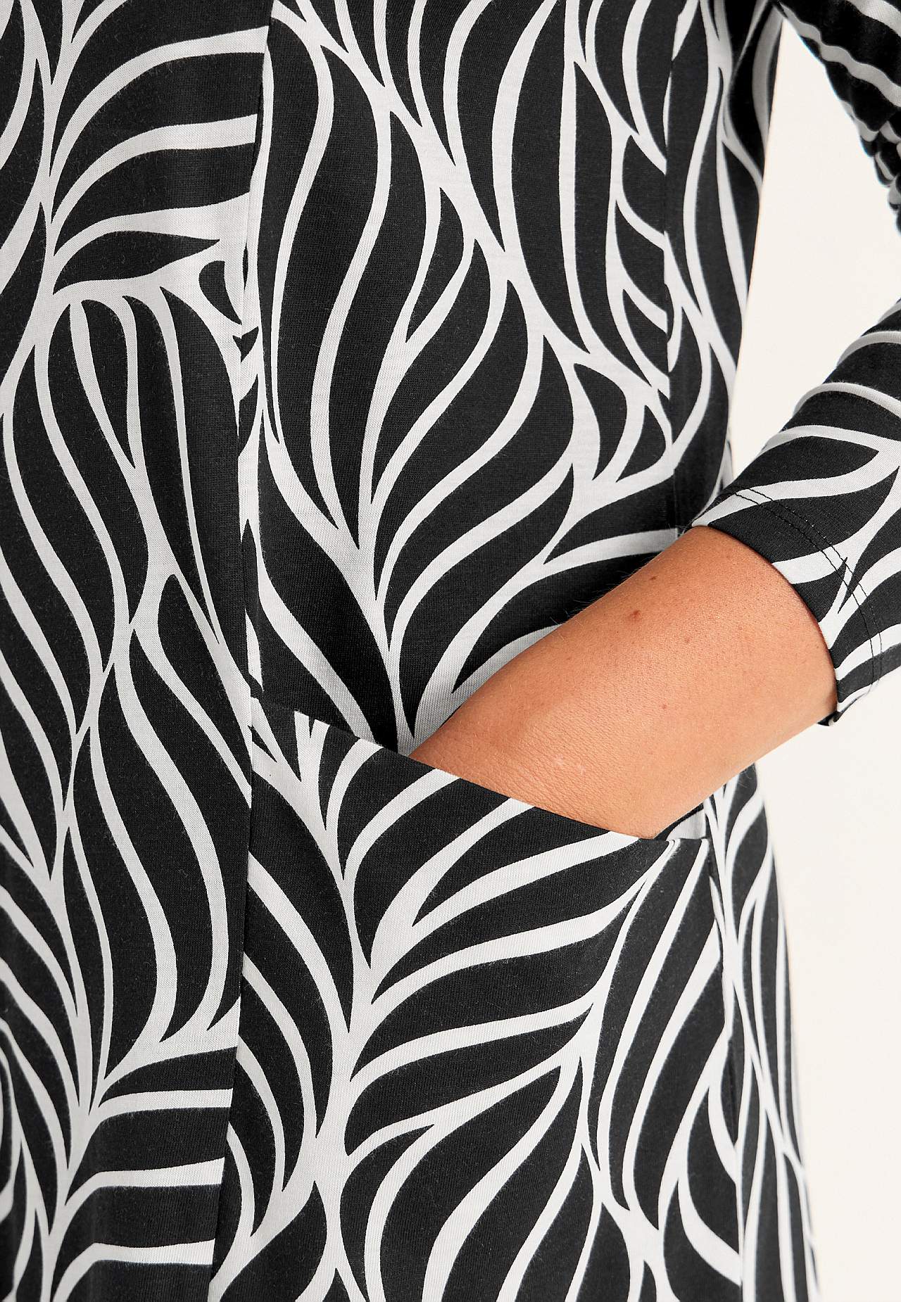 Trikotāžas tunika ar kabatām