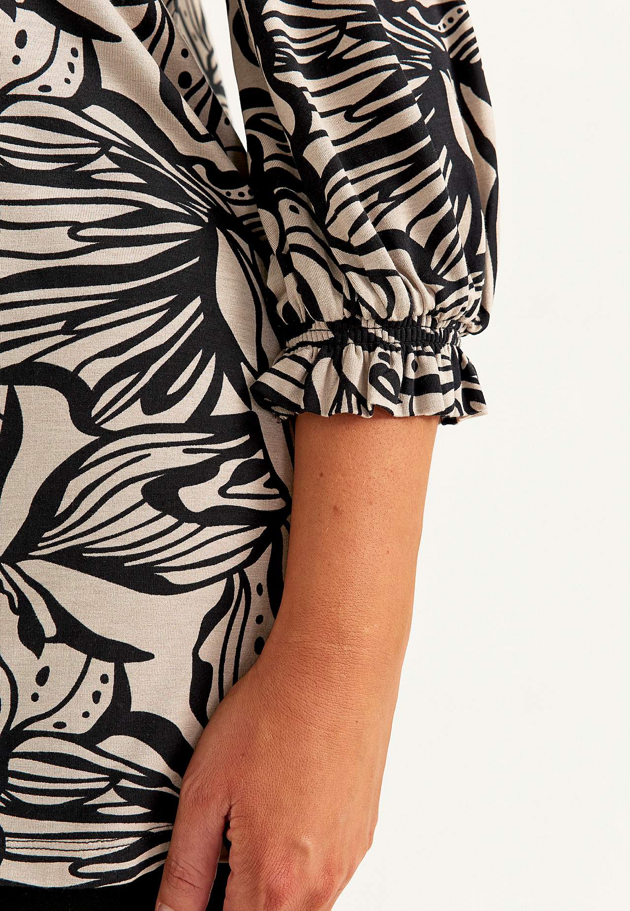 Trikotāžas tunika ar savilkumu